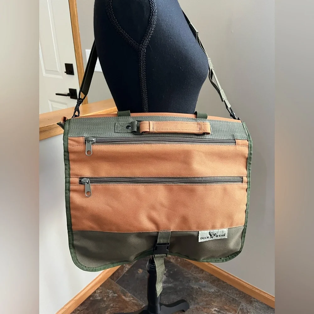 Duck Wear canvas messenger lap top bag adjustable should strap. Green & tan